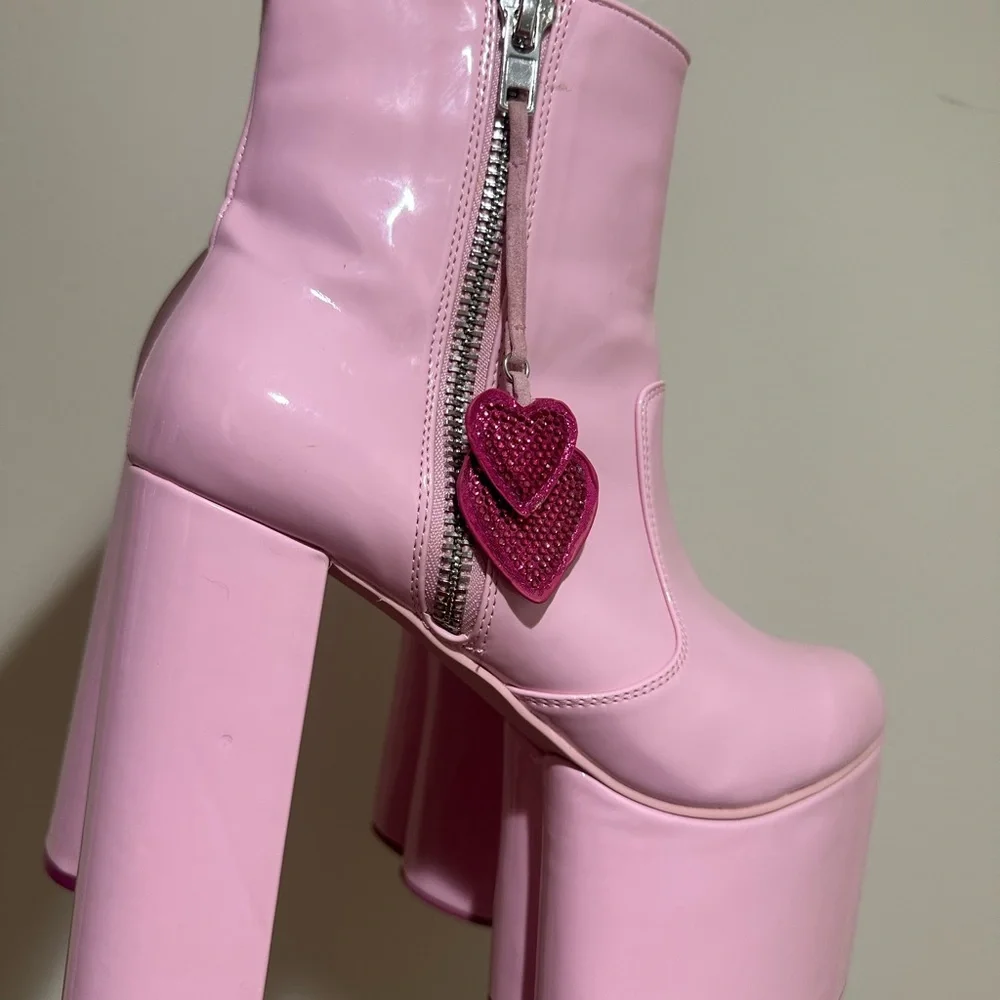 Dolls Kill Glossy Pink Platform Boots with Heart Accents